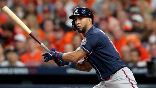 Braves left fielder Eddie Rosario hits a double during the seventh inning against the Houston Astros in game 1 of the World Series at Minute Maid Park, Tuesday October 26, 2021, in Houston, Tx. Curtis Compton / curtis.compton@ajc.com