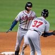 Atlanta Braves' Forrest Wall, left, celebrates with third base coach Ron Washington, right, after hitting a two-run home run during the sixth inning of the second game of a baseball doubleheader against the Washington Nationals, Sunday, Sept. 24, 2023, in Washington. (AP Photo/Stephanie Scarbrough)