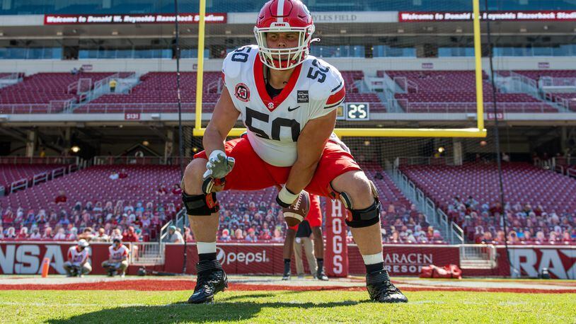 Georgia offensive lineman Warren Ericson practices at center during pregame warmups for the Arkansas game on Sept. 26 in Fayetteville, Ark. (By Tony Walsh/UGA)