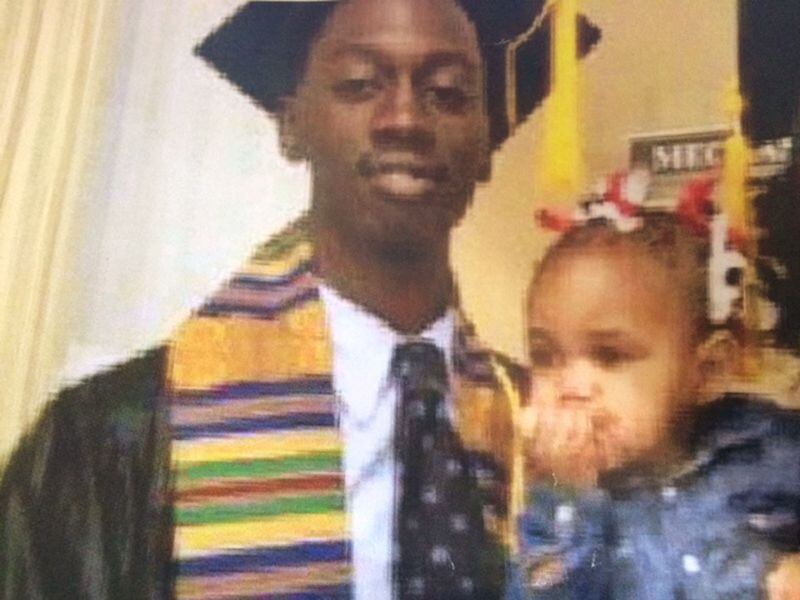 Deaundre Phillips, 24, pictured with his daughter, was shot dead on Thursday, Jan. 26, 2017, outside an Atlanta Public Safety Annex. (Family photo)