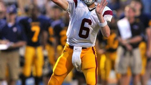 Brant Sanderlin Lassiter quarterback Hutson Mason passes against Wheeler High School in 2009.