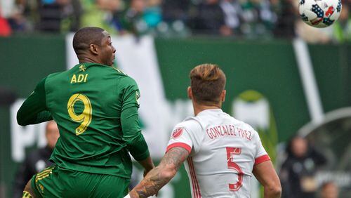 Portland Timbers forward Fanendo Adi (9) heads the ball during the first half at Providence Park. (Craig Mitchelldyer-Portland Timbers)