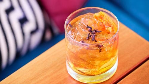 Gypsy Kitchen's Smoke in the Orchard combines Slow & Low rye, peach liqueur and orange bitters. Courtesy of Gypsy Kitchen