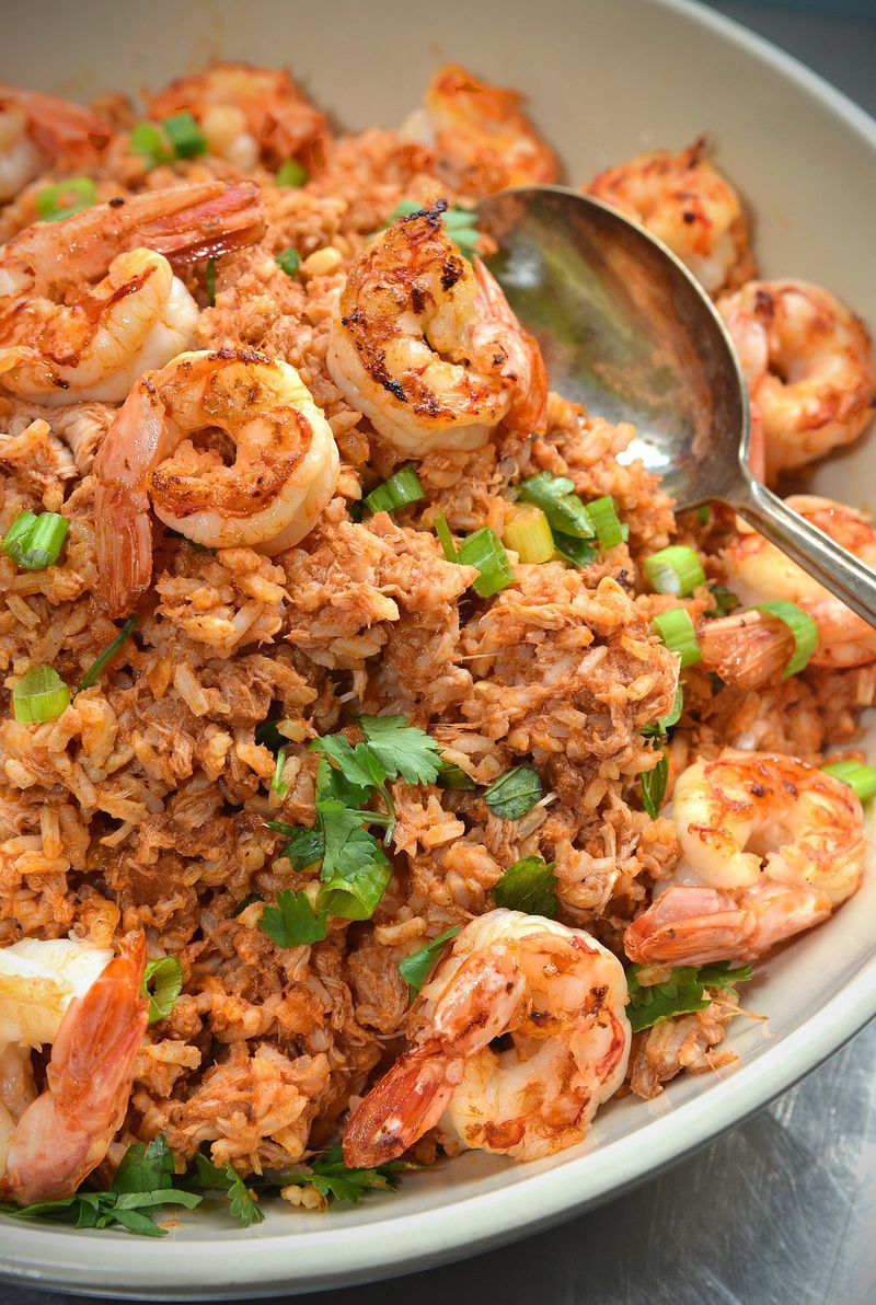 For Red Rice with Butter Fried Shrimp and Herbs, mix the base with any kind of cooked rice and eat it as a side dish. Add protein of choice (sausage, fish, crab, etc.) and serve it as a main. STYLING BY WENDELL BROCK. CONTRIBUTED BY CHRIS HUNT