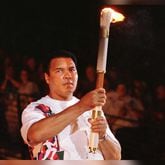 Muhammad Ali lit the cauldron at the opening ceremonies for the 1996 Olympic Games in Atlanta. (Andy Clark / Reuters)