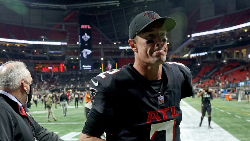 Atlanta Falcons quarterback Matt Ryan (2) jogs off of the field after their loss against the New Orleans Saints 30-20 at Mercedes-Benz Stadium, Sunday, January 9, 2022, in Atlanta. JASON GETZ FOR THE ATLANTA JOURNAL-CONSTITUTION