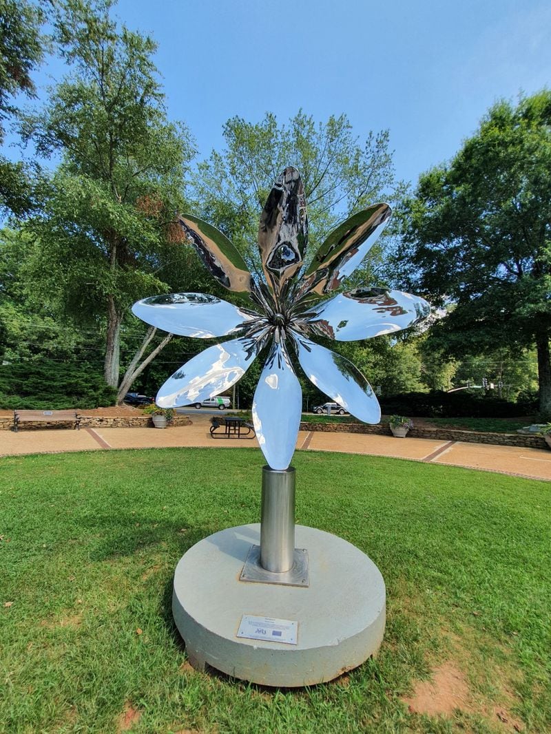 The fragile nature of a flower is explored in David Landis’ “Sentience,” displayed on Canton Street in Roswell. 
Courtesy of Cultural Gorilla.