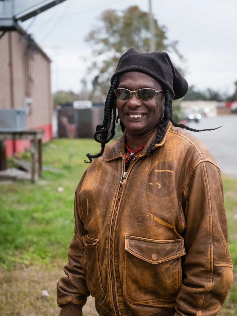 Fraisher Poole, 66, stands behind a local business in the area she typically spends the night, Jan. 4, 2024, in Brunswick, Ga. Poole is one of the first residents selected for a home once the Hand in Hand facility opens. (Photo Courtesy of Justin Taylor/The Current GA)