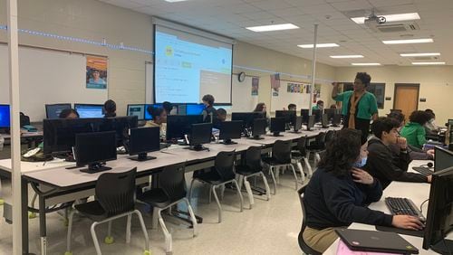 Students in Autumn Sutton's computer science class are learning about cybersecurity through an online game offering cash incentives.
