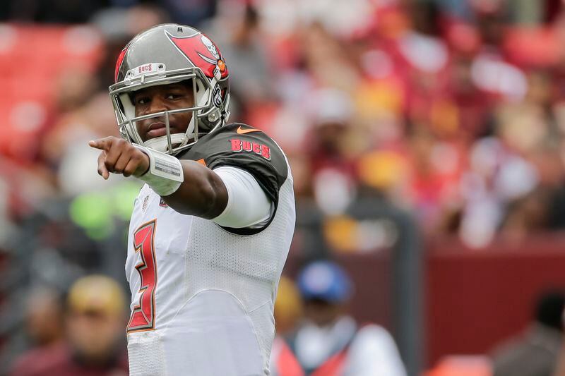 Tampa Bay Buccaneers quarterback Jameis Winston (3) points down the line the during the first half of an NFL football game against the Washington Redskins in Landover, Md., Sunday, Oct. 25, 2015. (AP Photo/Mark Tenally)