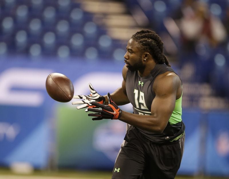 Georgia running back Keith Marshall runs a drill at the NFL football scouting combine in Saturday, Feb. 27, 2016, in Indianapolis. (AP Photo/Darron Cummings)