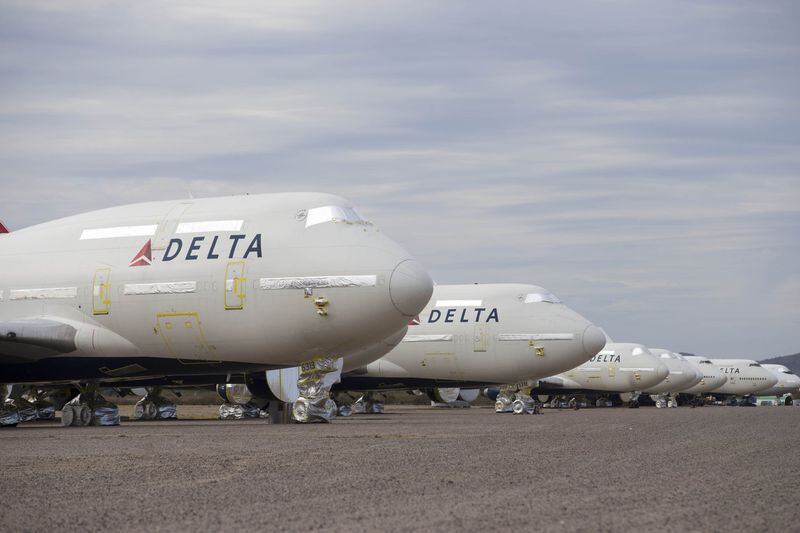 01/03/2018 — Marana, AZ, - Retired Delta airplanes rest inside PinalAirpark in Marana, Arizona, Wednesday, January 3, 2018. At PinalAirpark, airlines are able to salvage parts from their used aircrafts and offer up the unwanted pieces for recycling. ALYSSA POINTER/ALYSSA.POINTER@AJC.COM