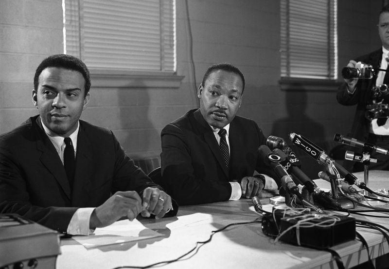 In 1961, Young joined the Atlanta-based Southern Christian Leadership Conference, where he quickly became one of Martin Luther King Jr.'s top lieutenants. Young organized leadership workshops and voter registration drives, becoming the SCLC's executive director in 1964. This photo is from a 1967 press conference. (Bob Dendy / AJC Archive at GSU Library AJCN160-097f)