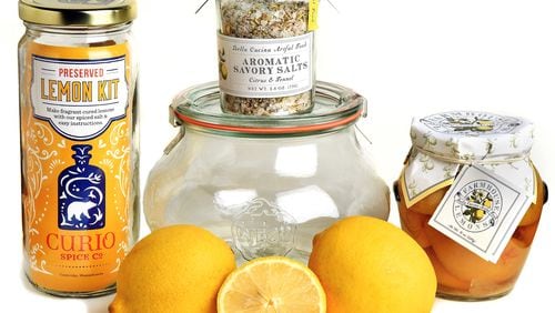 Gift items from Bella Cucina include (from left) a preserved lemon kit, a food citrus and fennel kit, and a jar of farmhouse lemons. Chris Hunt for The Atlanta Journal-Constitution