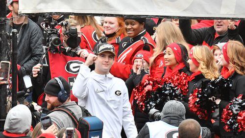 January 15, 2022 Athens - Georgia's quarterback Stetson Bennett (13) gestures as he takes in the DawgWalk during the celebration of Georgia’s College Football Playoff national championship at Sanford Stadium in Athens on Saturday, January 15, 2022. Georgia captured the national championship, its first since the 1980 season, with a 33-18 victory over Alabama at Lucas Oil Stadium in Indianapolis. (Hyosub Shin / Hyosub.Shin@ajc.com)