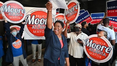 August 17, 2021 Atlanta - Atlanta City Council President Felicia Moore pumps her fist after filing paperwork for November 2nd Atlanta Mayoral Election outside the Atlanta City Hall on Tuesday, August 17, 2021. Atlanta City Council President Felicia Moore and former Atlanta mayor Kasim Reed filed paperwork and qualified as a candidate in the November 2nd Atlanta Mayoral Election.  (Hyosub Shin / Hyosub.Shin@ajc.com)