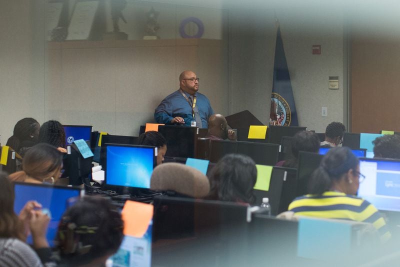 Mario Chiclana-Benitez speaks to trainees at the VA’s crisis hotline call center training room in Atlanta, Tuesday, Dec. 13, 2016. BRANDEN CAMP / SPECIAl