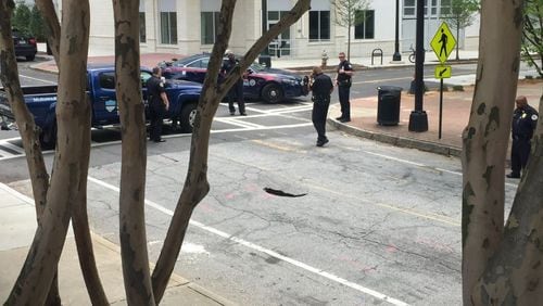 Authorities were on the scene Wednesday of a sinkhole that closed 5th Street in Midtown. (Credit: Zach Al-Nasser)