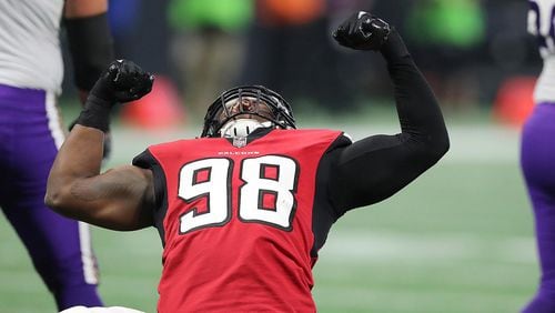 December 3, 2017 Atlanta: Falcons defensive end Takkarist McKinley reacts to sacking Vikings quarterback Case Keenum during the second quarter in a NFL football game on Sunday, December 3, 2017, in Atlanta.  Curtis Compton/ccompton@ajc.com
