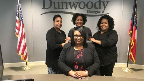 Dunwoody court clerks (back row, left to right) Monique Andrews, Chryse’ Bowers and Rochelle Sanderson with Court Clerk Norlaundra Huntington