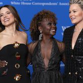 Actress Sophia Bush, White House Press Secretary Karine Jean-Pierre and former football player Ashlyn Harris, poses for photographers as they arrives at the annual White House Correspondents' Association Dinner in Washington, Saturday, April 27, 2024. (AP Photo/Jose Luis Magana)