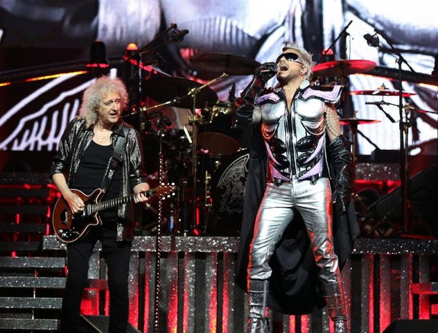 Queen + Adam Lambert performs "Hammer To Fall" at State Farm Arena on Monday, October 23, 2023.
Robb Cohen for the Atlanta Journal-Constitution