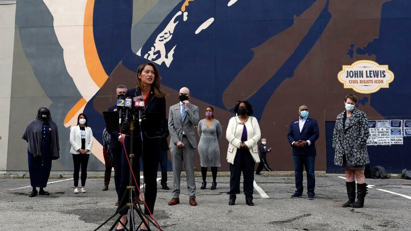 State Rep. Bee Nguyen, D-Atlanta, speaks Tuesday at a press conference at the John Lewis mural on Auburn Avenue in downtown Atlanta. Democratic lawmakers announced the introduction of two bills that would restore the right to vote to felons in Georgia. (Rebecca Wright for the Atlanta Journal-Constitution)