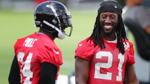 June 13, 2017, Flowery Branch: Atlanta Falcons cornerbacks Desmond Trufant and Brian Poole share a laugh during the first day of mini-camp on Tuesday, June 13, 2017, in Flowery Branch. Curtis Compton/ccompton@ajc.com