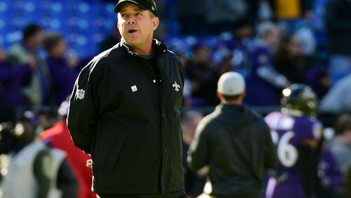 New Orleans Saints head coach Sean Payton watches his team warm up before the game against the Baltimore Ravens at M&T Bank Stadium.