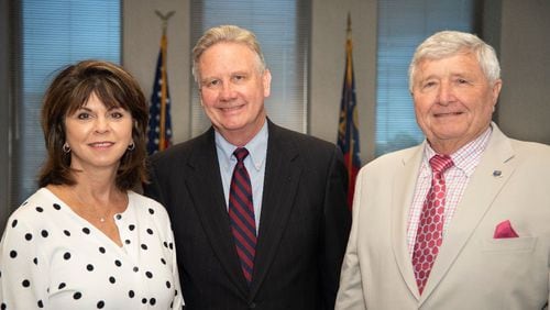 Tim Golden of Valdosta (center) is the new chairman of the State Transportation Board. Rudy Bowen of Suwanee (right) is vice chairman and Emily Dunn of Blue Ridge is secretary.