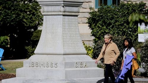 Behind the old courthouse in Decatur Square sits this Confederate monument. A coalition of civil rights groups and churches are hoping to move the monument to private property as part of a larger exhibit addressing social justice issues. BOB ANDRES /BANDRES@AJC.COM