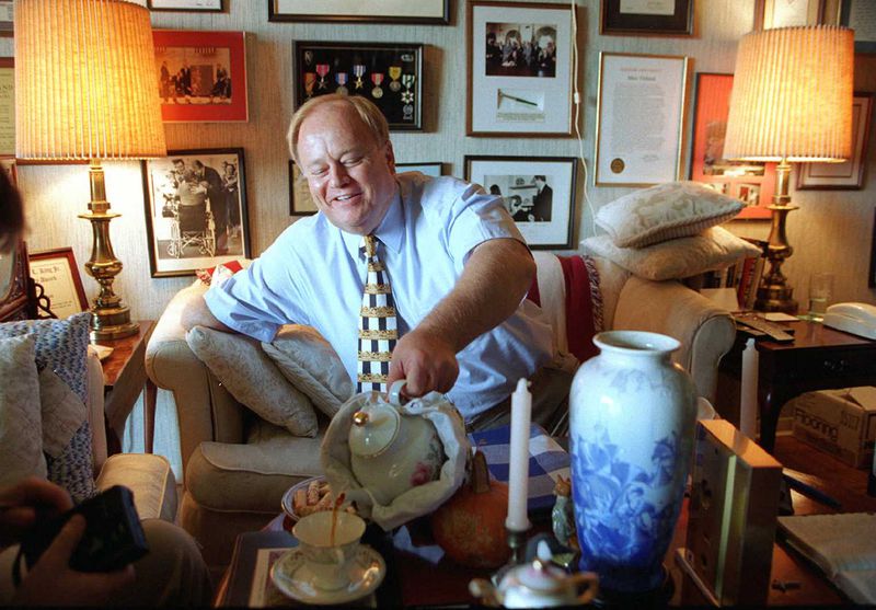 Max Cleland at home in his Buckhead, Georgia apartment in 1996. About every square inch of his walls are decorated with memorabilia from his career. (AJC Staff Photo/Phil Skinner) Frame # 31.