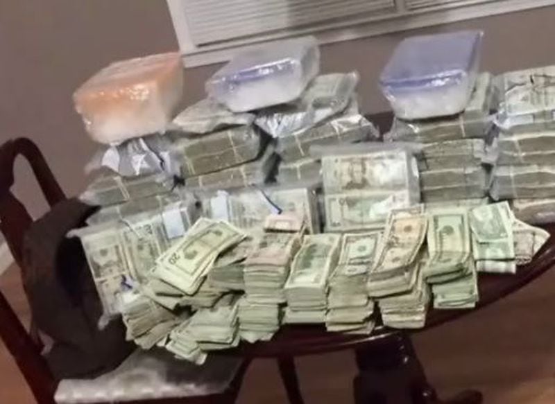 Nearly $750,000, three kilos of meth and cocaine were seized from alleged drug traffickers in Newnan on Monday. (Credit: Channel 2 Action News)