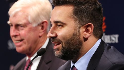 Braves CEO Terry  McGuirk (left) introduced new Braves general manager Alex Anthopoulos at a Monday news conference in Atlanta. (Curtis Compton/ccompton@ajc.com)