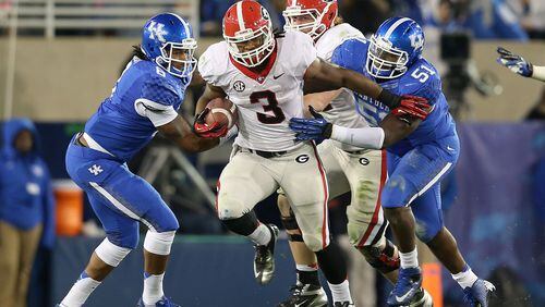 Todd Gurley #3 of the Georgia Bulldogs runs with the ball during the game against the Kentucky Wildcats at Commonwealth Stadium on October 20, 2012 in Lexington, Kentucky.