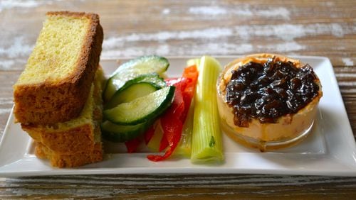 The pimento cheese, topped with a syrupy bacon jam, comes with veggies and toasted house-made gluten-free bread. JENNY TURKNETT / SPECIAL