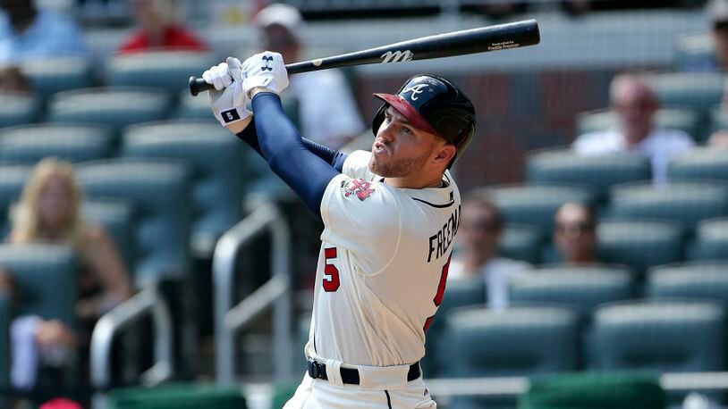 Freddie Freeman, showing during Sunday’s win against Cincinnati, said the strength in his left wrist is only at about 80-85 percent since he returned from a seven-week stint on the disabled list after it was fractured when hit by a pitch May 17. (AP Photo/John Bazemore)