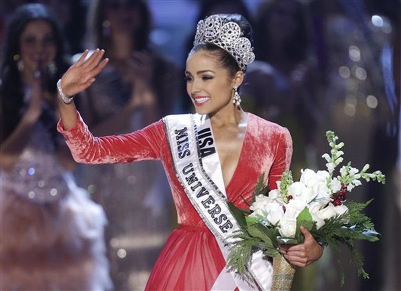 Miss USA, Olivia Culpo, waves to the crowd after being crowned as Miss Universe during the Miss Universe competition, Wednesday, Dec. 19, 2012, in Las Vegas. (AP Photo/Julie Jacobson)