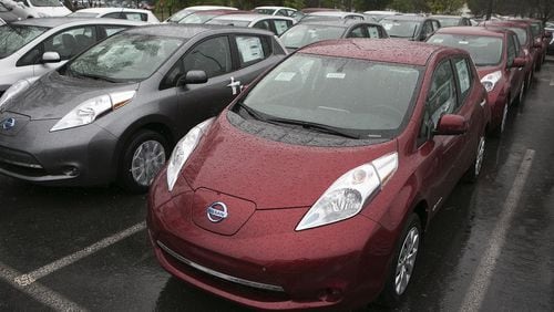 Last year, Atlanta was reportedly the top market nationwide for Nissan Leafs. (This lot is at Town Center Nissan.) However, Georgia lawmakers passed a bill that will eliminate the $5,000 state tax credit for EVs ($2,500 for low-emission vehicles) purchased after July 1 and charge drivers of EVs and hybrids a $200 annual registration fee. CONTRIBUTED BY PHIL SKINNER