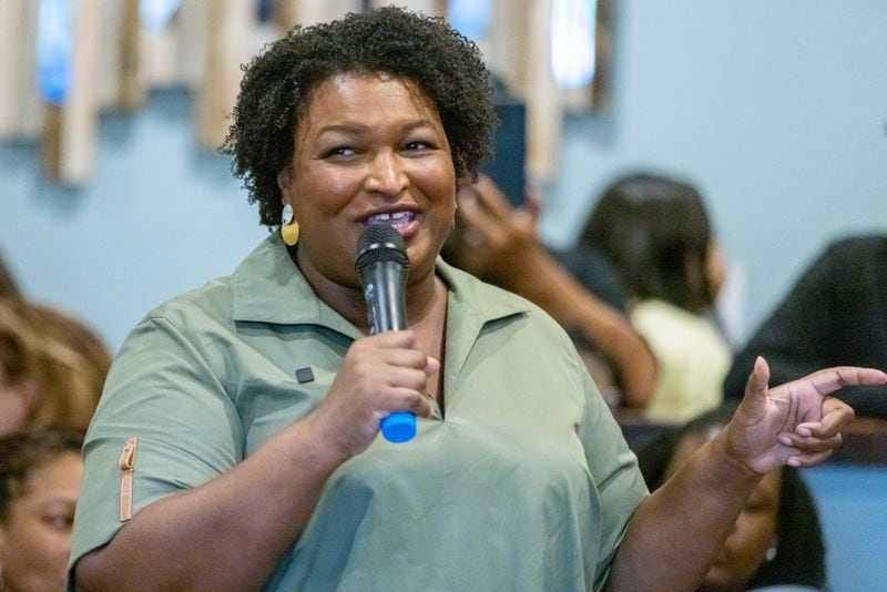 Democratic candidate for Georgia governor Stacy Abrams talks to a crowd during a campaign stop at the Two Eggs restaurant in McDonough Saturday, July 9, 2022. (Steve Schaefer / steve.schaefer@ajc.com)