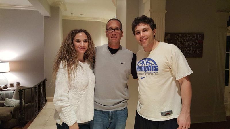 Ronald Bell, a reformed drug addict and former prison inmate, center, posed with Josh Pastner and his wife, Kerri, in their former home in Memphis. Pastner is now the head coach at Georgia Tech. Bell befriended Pastner and committed NCAA rules violations on his behalf, he claims. 