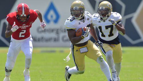Georgia Tech defensive back Lawrence Austin (20) runs after he made an interception in the first half of the Georgia Tech home opener at Bobby Dodd Stadium on Saturday, September 9, 2017.  HYOSUB SHIN / HSHIN@AJC.COM