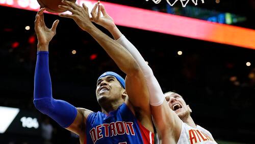 Detroit Pistons forward Tobias Harris (34) and Atlanta Hawks forward Mike Muscala (31) fight for a rebound in the first half of an NBA basketball game Friday, Dec. 2, 2016, in Atlanta. (AP Photo/John Bazemore)