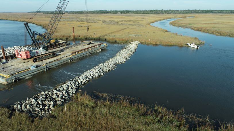 The Army Corps of Engineers has blocked off man-made cuts through Georgia's coastal salt marsh, restoring the natural flow of water.