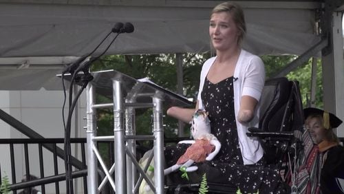Aimee Copeland, a Gwinnett native who underwent amputations after contracting a flesh-eating bacteria in 2012, delivered the commencement address at Georgia Gwinnett College on Thursday. (YouTube screengrab)