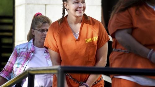 Reality Winner, charged with leaking a top-secret government document to a news outlet, walks into the federal courthouse in Augusta, Ga., Tuesday, June 26, 2018. (Michael Holahan/The Augusta Chronicle via AP)