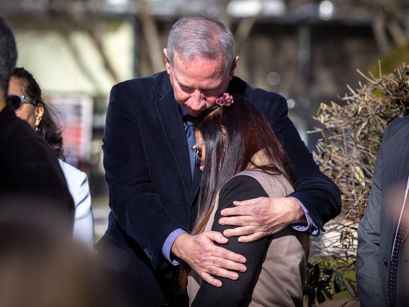 Joel Paez and Belkis Teran, parents of Manuel “Tortuguita” Teran, embrace at a press conference in Decatur on Monday, February 6, 2023. Manuel Teran was killed last month near the site of Atlanta’s planned public safety training center. He was shot by police at least 13 times, attorneys for the family said. (Arvin Temkar / arvin.temkar@ajc.com)
