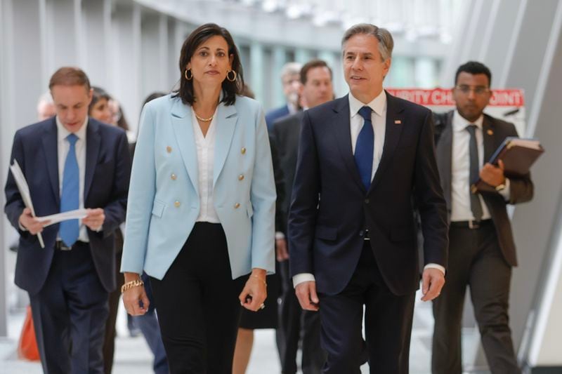 (Left to right) Center for Disease Control director Rochelle Walensky walks alongside U.S. Secretary of State Antony Blinken as he tours the CDC in Atlanta on Friday, May 5, 2023. (Natrice Miller/The Atlanta Journal-Constitution)