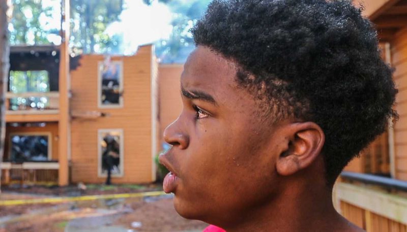  Antonio Senior, 15,  is credited with saving a woman,who was forced to take the leap moments before the building in the 2000 block of Ficus Court collapsed on Friday, April 27, 2018. “She was scared,” he said. “She was shaking and said, ‘Thank you! Thank you!’” 