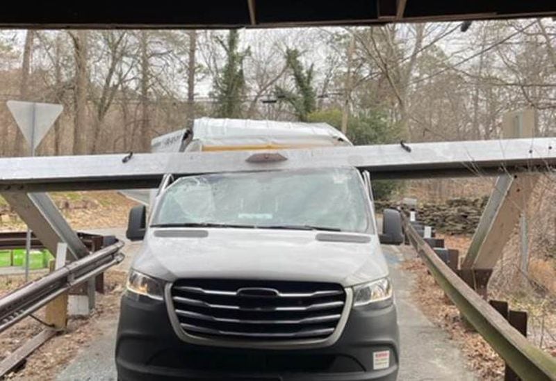 A rental truck crashed into the Concord Road historic covered bridge's protective beam Wednesday, Feb. 8, 2023, the third hit at the bridge so far this year. Cobb County